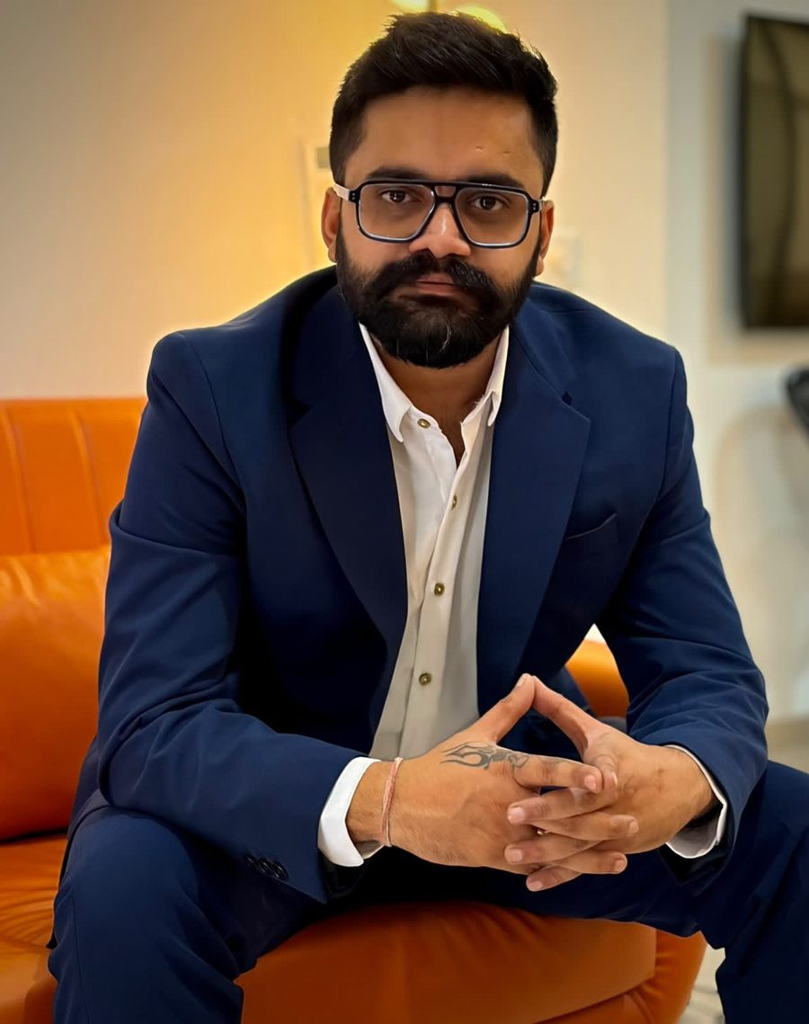 Nishant Singh of Capital Keys Real Estate, seated in a navy suit